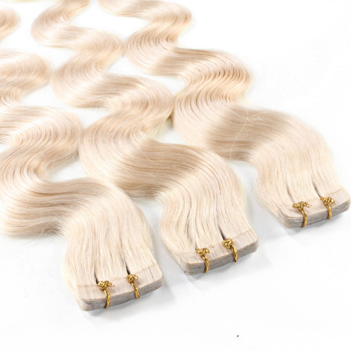 Tape Extensions gewellt aus Echthaar - Hair2Heart